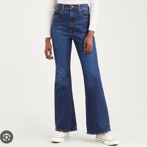 Levi’s 70s high rise flare dark blue jean in “sonoma step” wash size 28